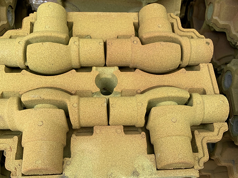 Jak vyřešit vadu na lepením písku při výrobě šedých litinových částí pomocí filmové technologie písku?